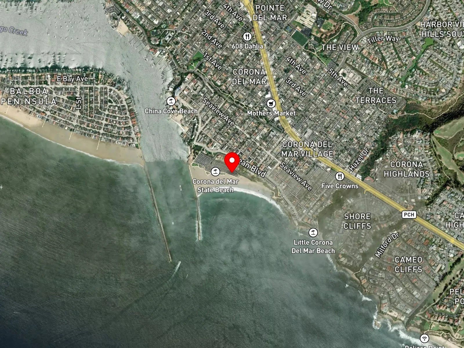 Map of Corona del Mar State Beach showing the east jetty, Iris Avenue lot, and Little Corona to the south