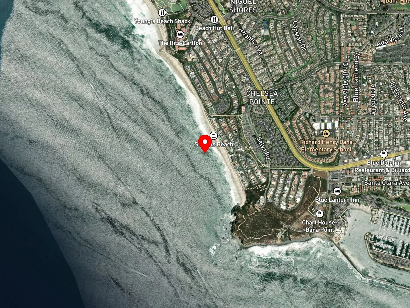 Map of Strands Beach showing Strand Vista Park, the trails down, and San Juan Rocks offshore